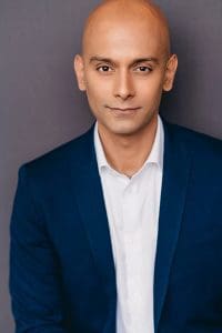 A professional head shot of Shawn Lall